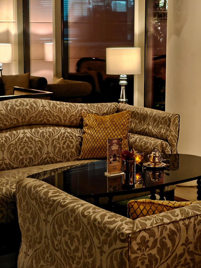 elegant-lounge-with-ornate-sofa-and-mood-lighting-31981910